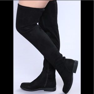 Black thigh high boots